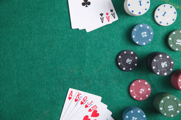 istock Casino chips and cards on the green table. 1223554956