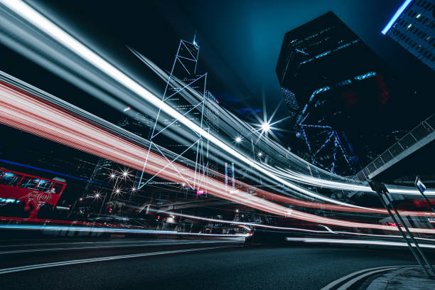 istock Illuminated Skyscrapers and light trails in Hong Kong 1223555051