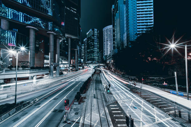 istock Illuminated Skyscrapers and light trails in Hong Kong 1223557240