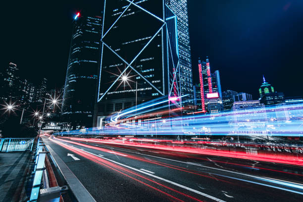 istock Illuminated Skyscrapers and light trails in Hong Kong 1223557250