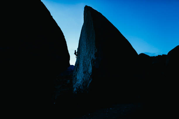 istock Rock climber bouldering in Bishop California 1223558120