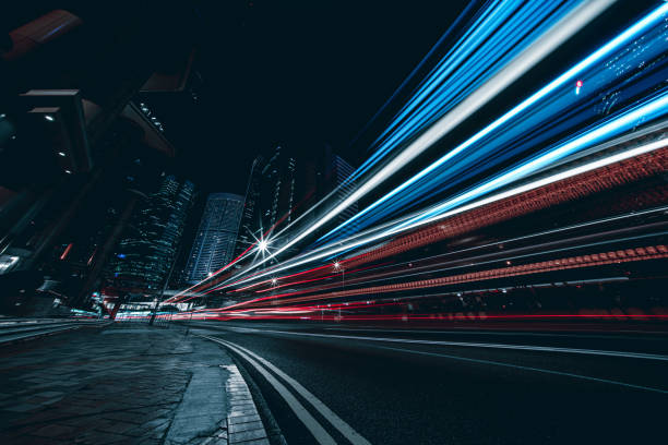 istock Illuminated Skyscrapers and light trails in Hong Kong 1223558940