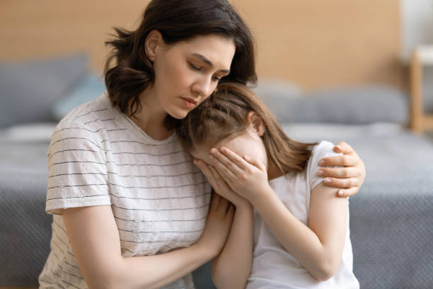 istock Mother is feeling sorry for a crying child. 1223559197