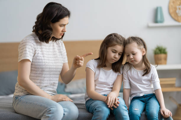 istock mother is scolding her children 1223559199