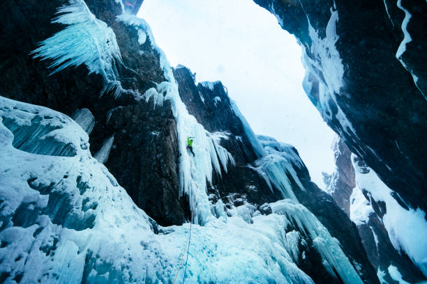 istock Ice climber climbing in Ouray Colorado during winter storm 1223559211