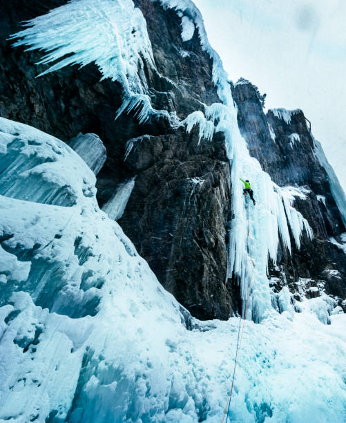 istock Ice climber climbing in Ouray Colorado during winter storm 1223559267