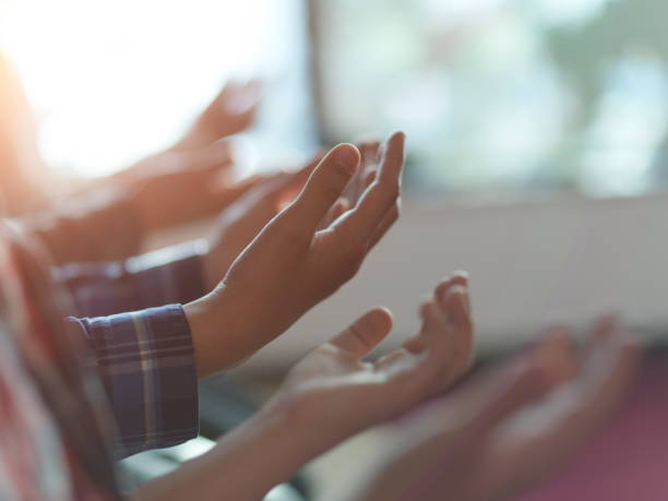 istock muslim people praying in mosque closeup on hands 1223560057