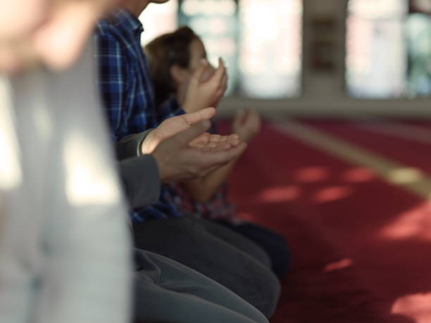 istock muslim people praying in mosque 1223560074