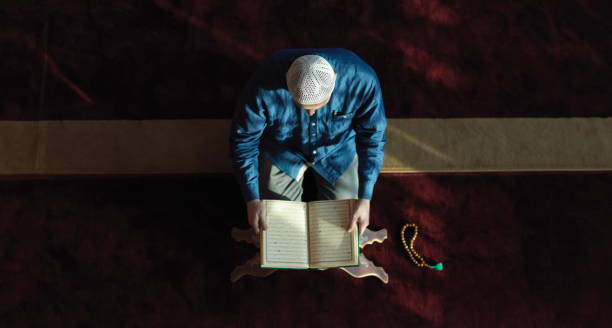 istock muslim man praying inside the mosque top view 1223560089