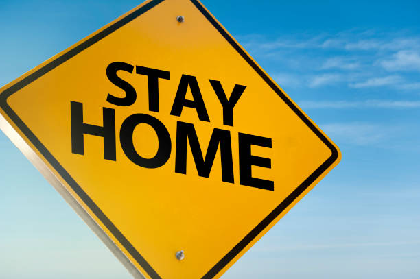istock STAY HOME  /Warning sign with dramatic sky (Click for more) 1223561387