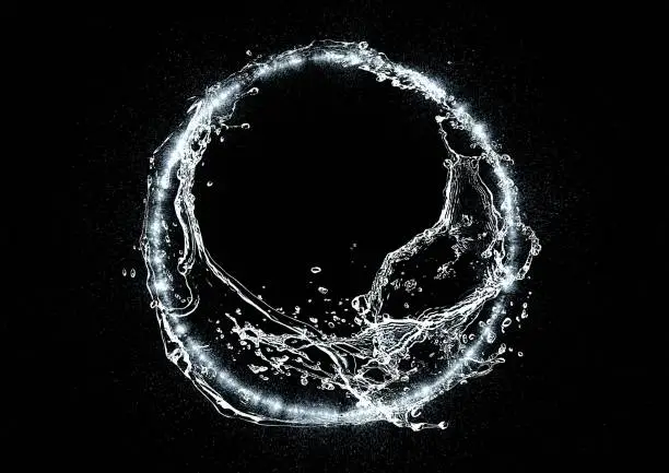 Photo of Abstract splashes swirling in the dark