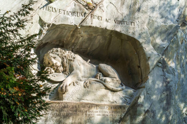 Famous Lion Monument (1820) by Bertel Thorvaldsen, commemorates Swiss guard massacred during French Revolution, Lucerne, Switzerland