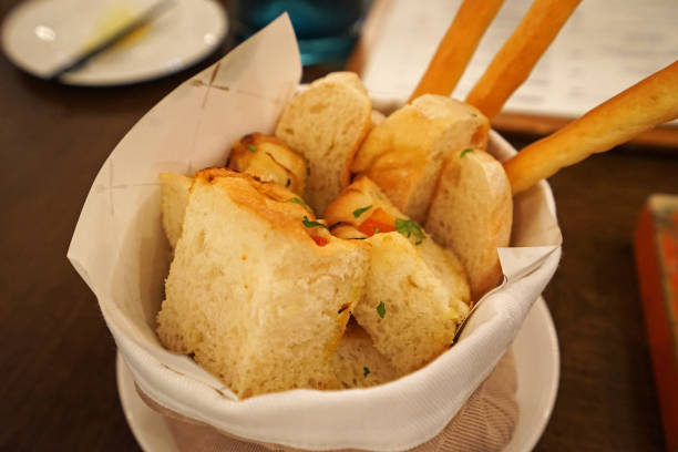 istock Close up Complimentary garlic bread and toast in appetizer basket 1223563576