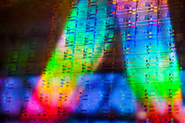 istock Close up of a silicon wafer of SIM computer chips. 1223563708