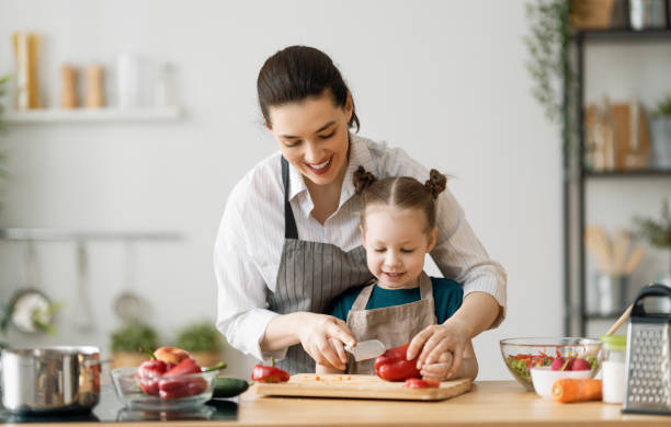 istock Happy family in the kitchen. 1223568064