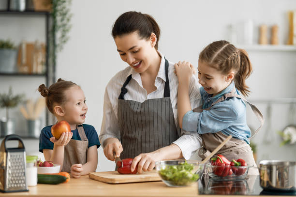 istock Happy family in the kitchen. 1223568067