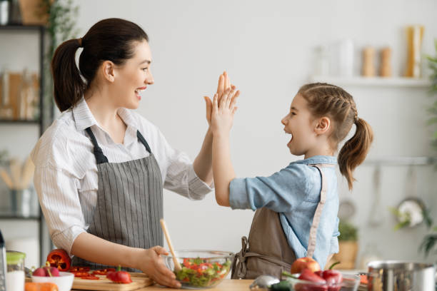 istock Happy family in the kitchen. 1223568093