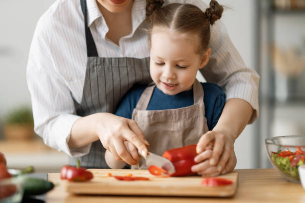 istock Happy family in the kitchen. 1223568108