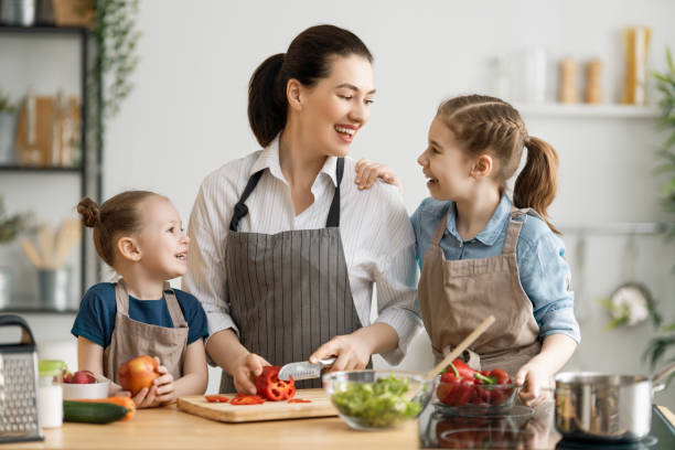 istock Happy family in the kitchen. 1223568113
