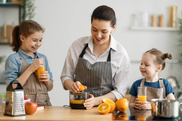 istock Happy family in the kitchen. 1223568138