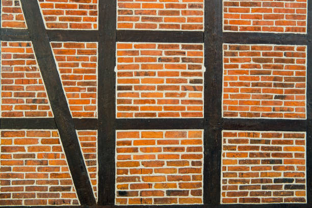 istock House wall of red bricks and wood textured surface 1223569977