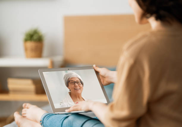 istock Young woman is chatting with mother. 1223570041