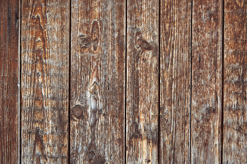 Old wooden boards with peeling paint. Testura from old boards with blue and red paint. Copy space, wooden background.