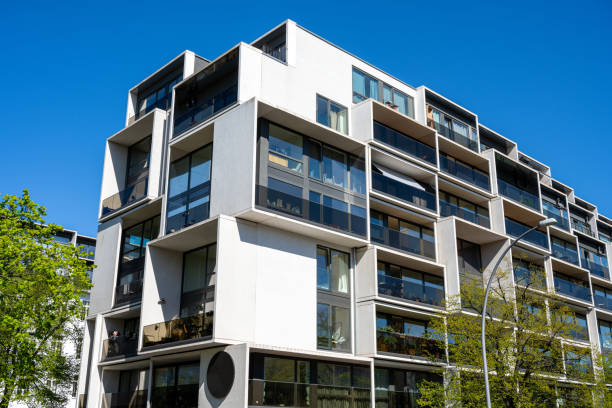 istock Modern apartment building with floor-to-ceiling windows 1223576230