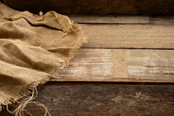 istock Old Wood floor background with burlap 1223580810