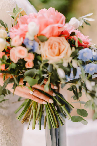 istock bride holding wedding bouquet in fine art style 1223581984