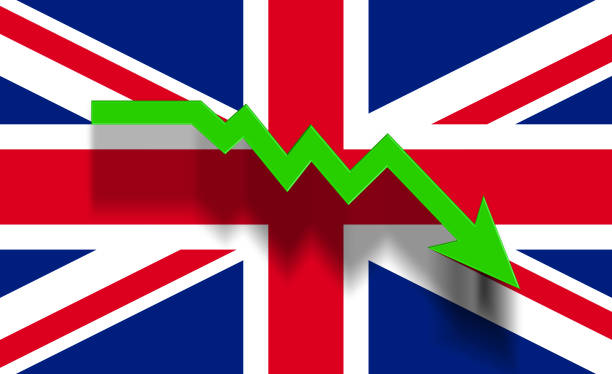 freccia grafica verde che si sposta verso il basso sulla bandiera britannica. - british flag currency banking uk foto e immagini stock