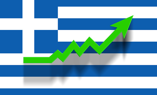 Green success graphic arrow moving up on Greece flag. Horizontal composition with copy space. Economy and finance concept