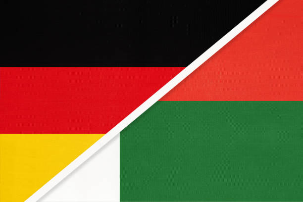 istock Germany vs Madagascar, symbol of two national flags. Relationship between European and African countries. 1223584810