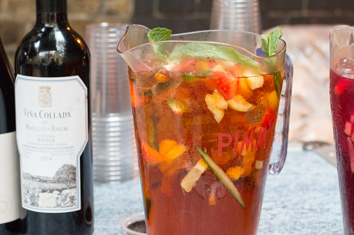 Sangria in Borough Market, London. Various alcohol brand names are visible in the background.