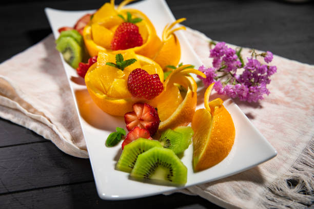 Fresh, organic fruits, light snacks in a plate