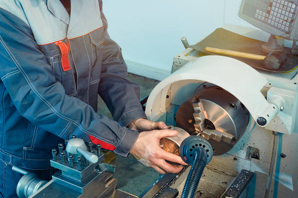 istock A worker drills a steel part 1223585857