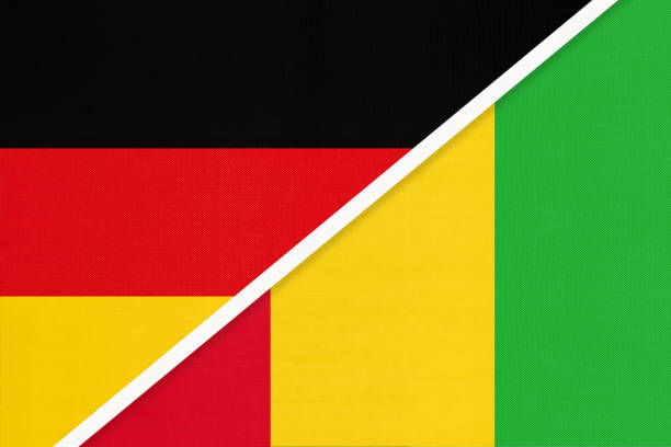 istock Germany vs Guinea, symbol of two national flags. Relationship between European and African countries. 1223586201