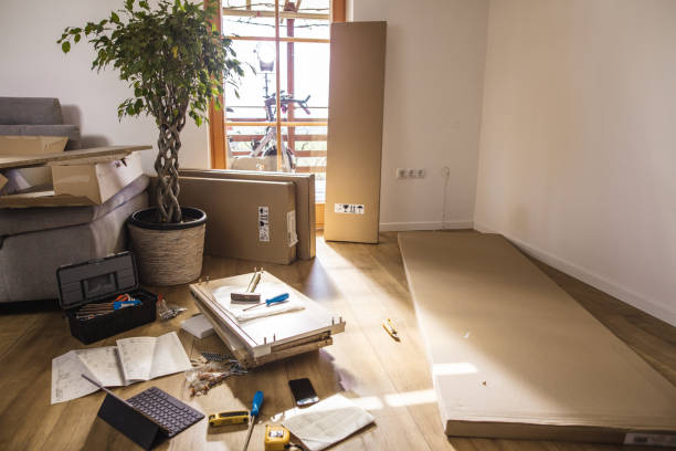 istock Flat-pack furniture and tools on floor at home 1223586993