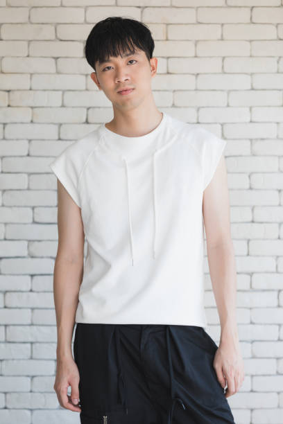 istock Sexy Asian model man standing and posing. 1223587049