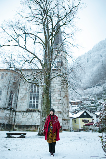 asian hijab traveler enjoy the winter season