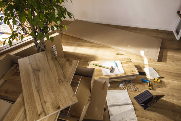 istock Flat-pack furniture and assembly tools on floor 1223587319