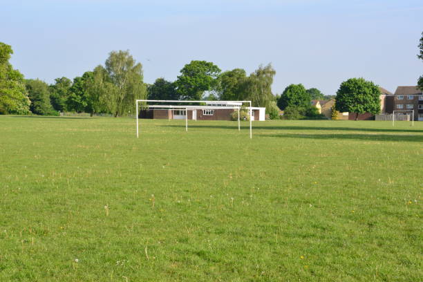 istock large playing field in Horley, Surrey in Springtime. 1223588864