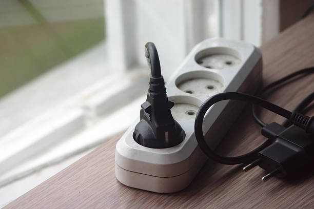 istock dusty electric extension cord on the table 1223592310