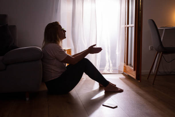 istock Sad depressed woman crying at home during COVID-19 1223592565