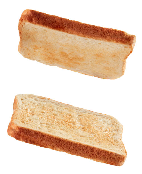 istock Slices of toasted bread flying isolated on white 1223592637