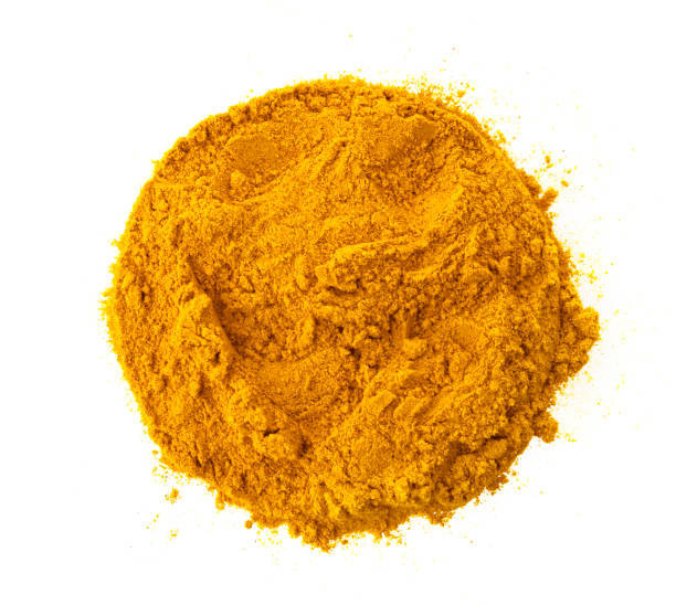 istock Turmeric powder, curcuma spice isolated on white background 1223592994