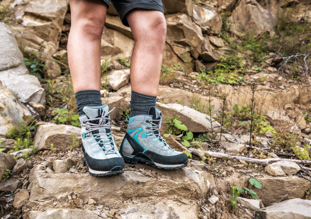 istock female legs in hiking boots 1223593736