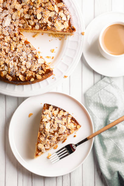 istock Sponge almond and lemon cake with a coffee 1223594062