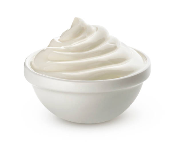istock Sour cream in bowl isolated on white background 1223594545
