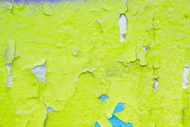 istock Old green dirty wall with cracked and peeling paint surface texture background. 1223595464